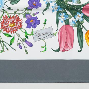 Gucci, a 'Flora' twill silk scarf.