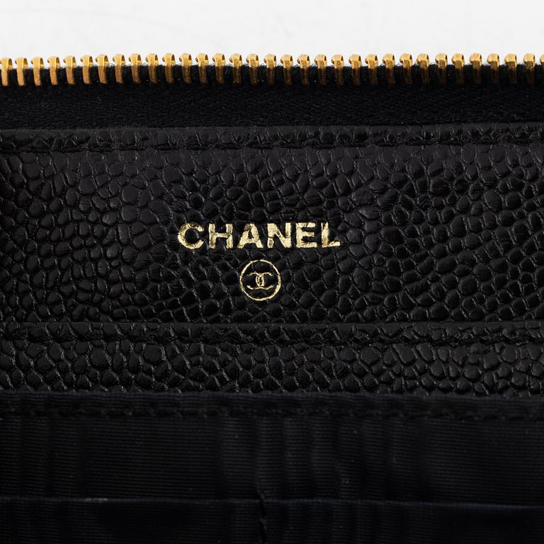 Chanel, A black caviar leather clutch, 1997 - 1999.