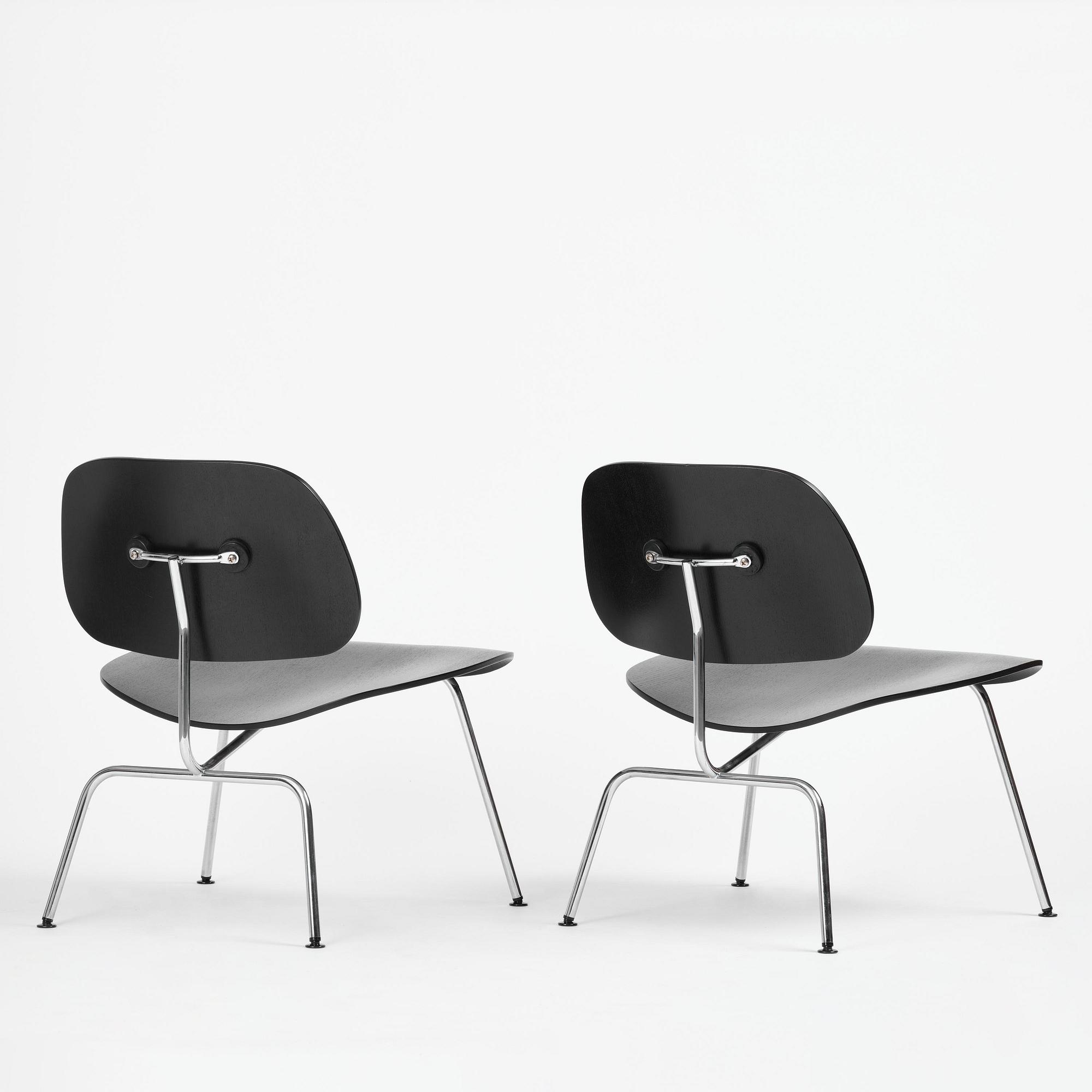 Charles & Ray Eames, a pair of "DCM" chairs, Vitra, 1997.