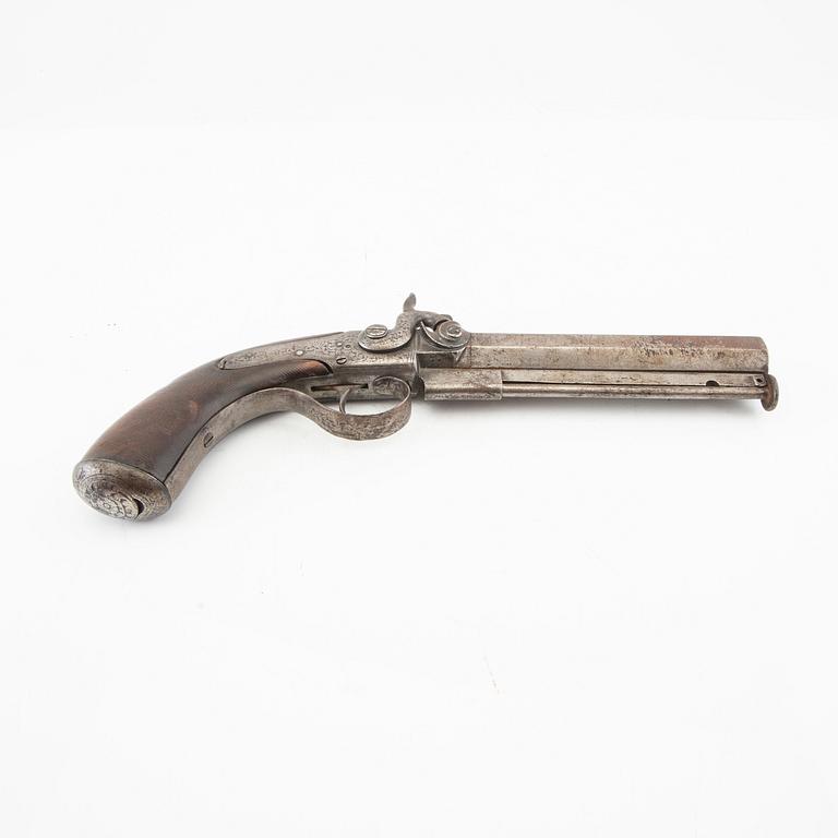 A percussion pistol, 19th century.