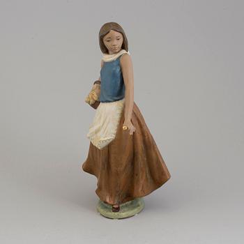 A Spanish NAO ceramic figurine, 1990s.