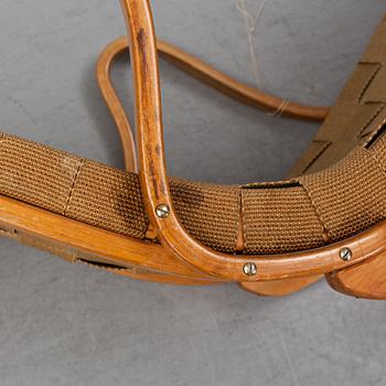 A lounge chair by Bruno Mathsson, mid 20th Century.