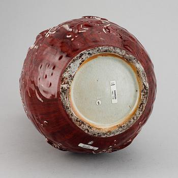 A red glazed Chinese vase, 20th century.