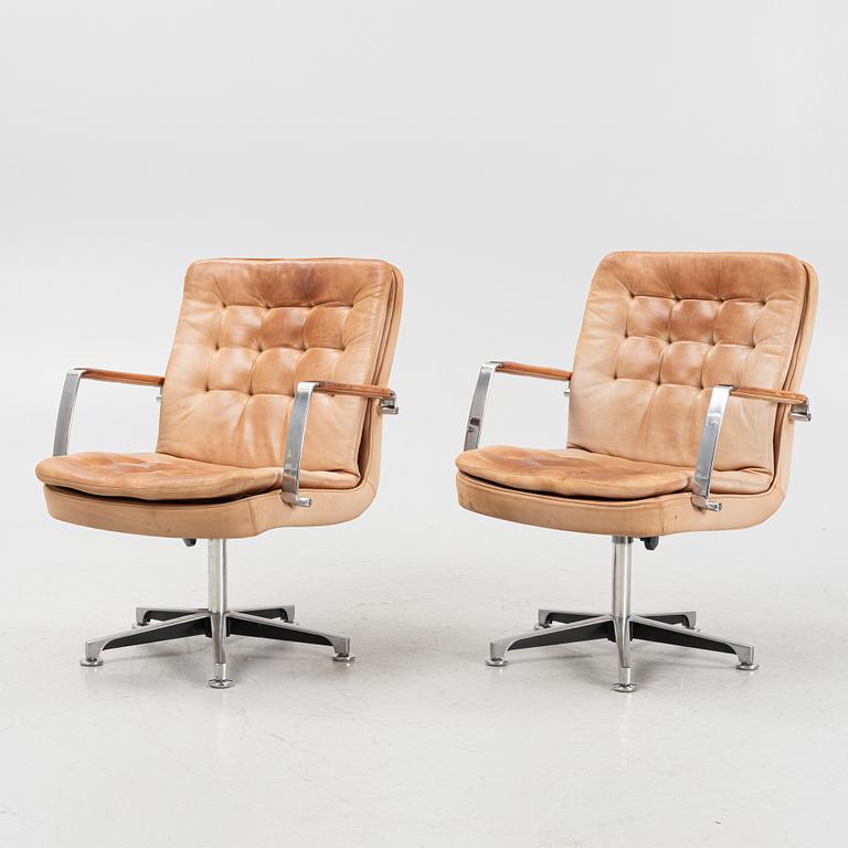 Kenneth Bergenblad, a pair of leather upholstered 'Herkules' armchairs from Dux.