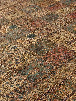 A CARPET. An old Kerman. 521 x 356 cm.