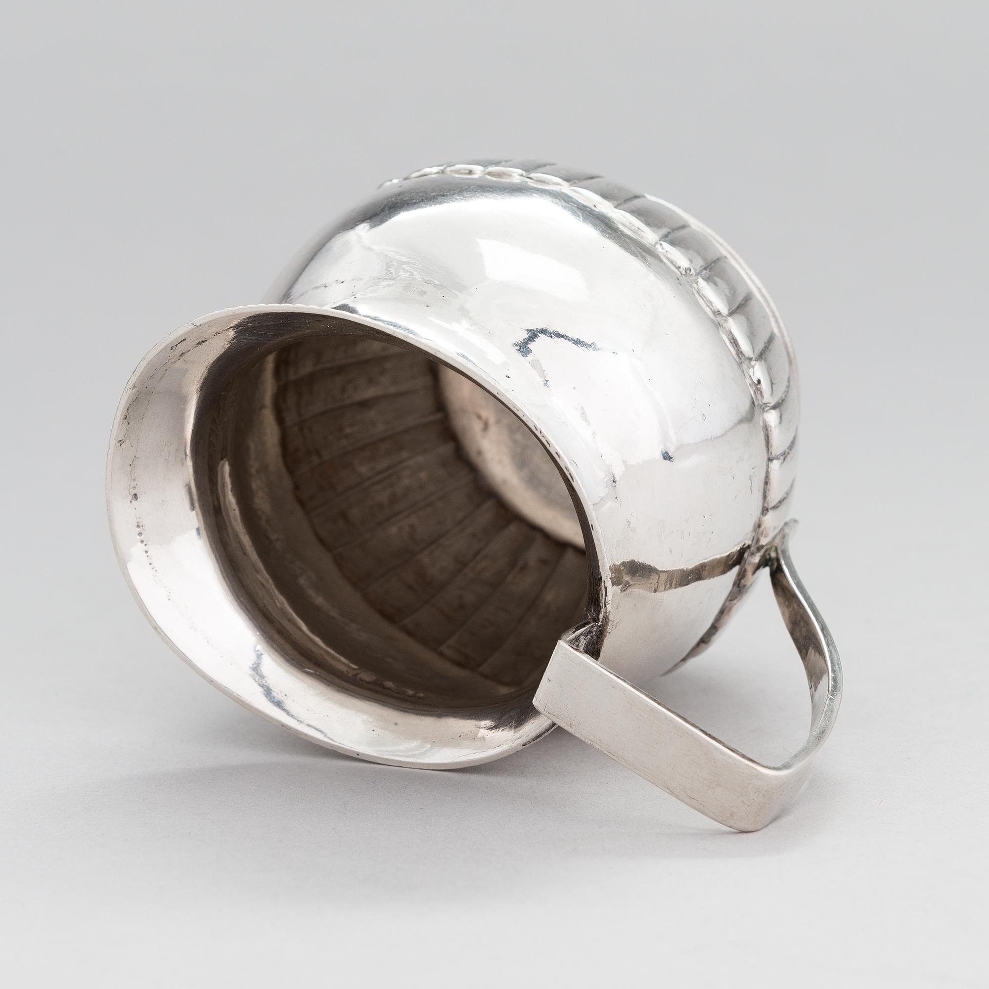 A silver, cream jug, Cyrillic maker's mark Sinkoni, Finland 1824.