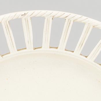 TWO CREAMWARE PLATES, one marked Wedgwood, first half of the 19th century and late 18th century.
