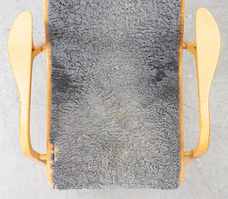 Yngve Ekström, a pair of 'Lamino' easy chairs, Swedese 2004.