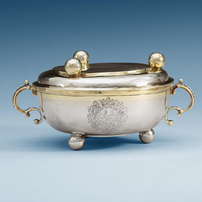 A Swedish early 18th century parcel-gilt bowl and cover, makers mark of Herman Hermansson, Gothenburg 1707.