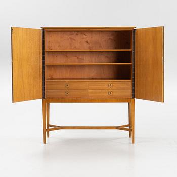 Erik Matsson, a walnut-veneered cabinet, Mjölby Intarsia, 1940's/50's.
