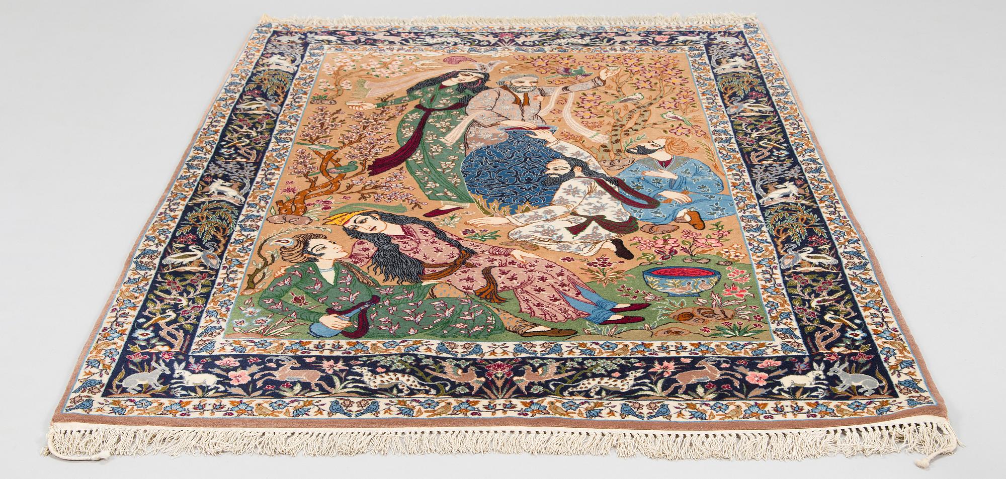 An Isfahan figural rug. Approx. 184x 121 cm.