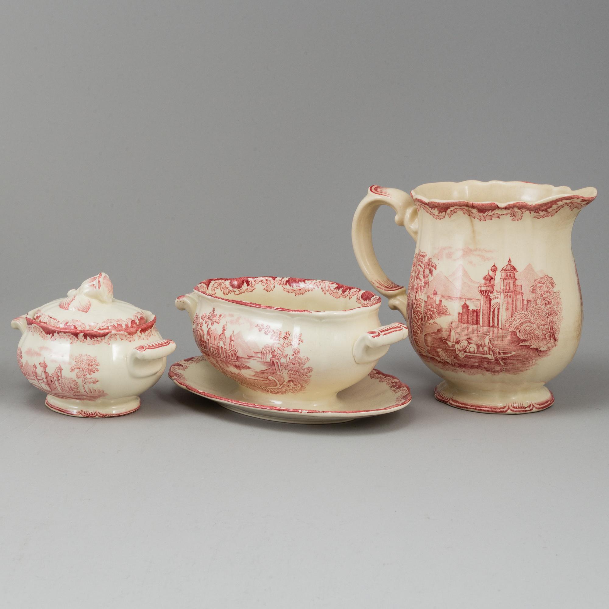 A part red 'Bengali' creamware dinner service, Rörstrand, 1948-56 (111 pieces).