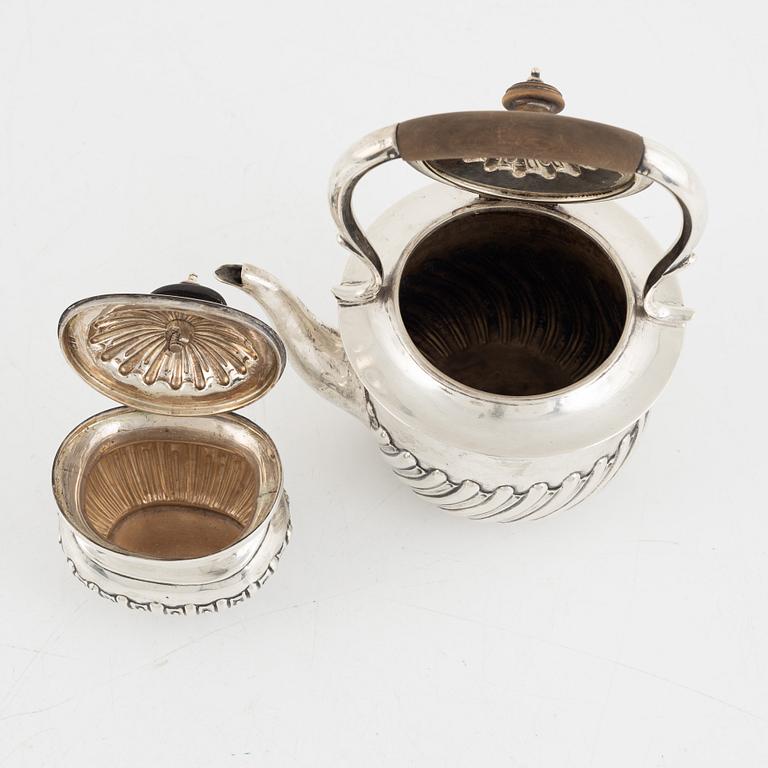 A silver coffee pot and a sugarbowl, including John Aldwinckle & Thomas Slater, London, England, 1844.