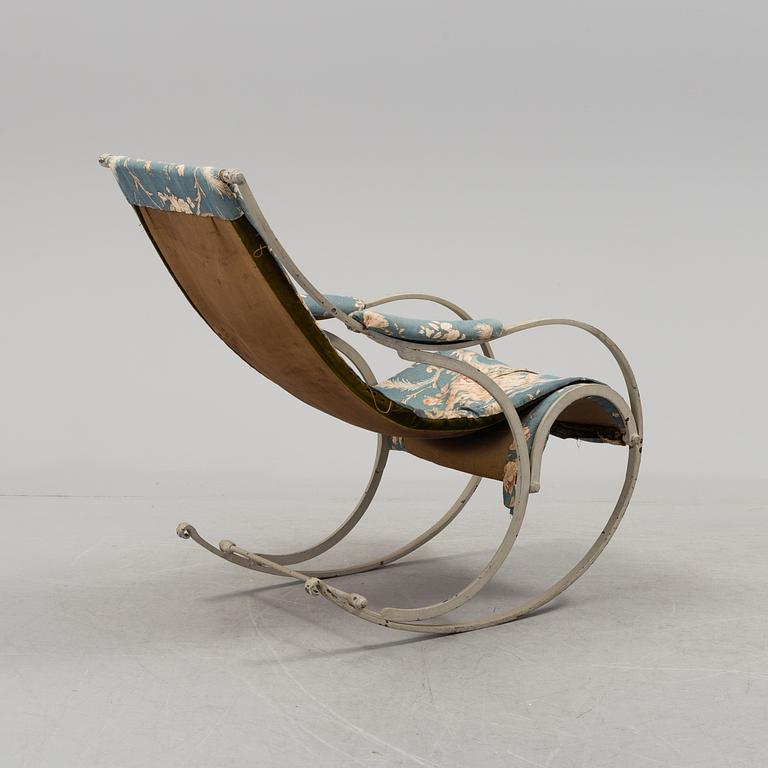 An iron rocking chair, 19th century.