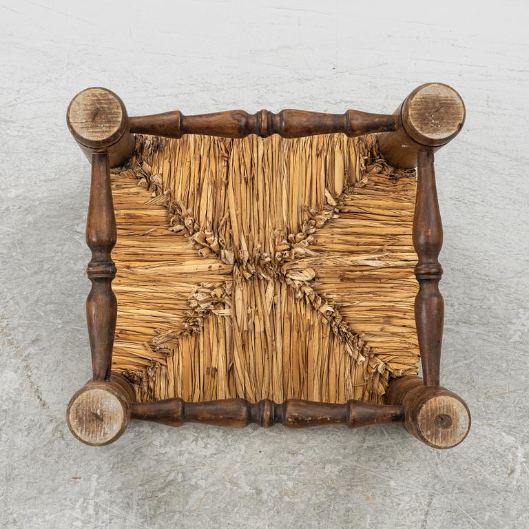 Charles Dudouyt, attributed to, a fireside low chair, mid 20th century.