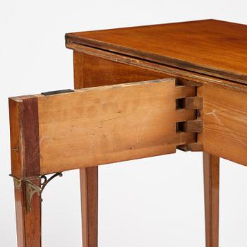 A late Gustavian mahogany games table, presumably by A. Nordström (Journeyman at G. Iwersson 1806-09).