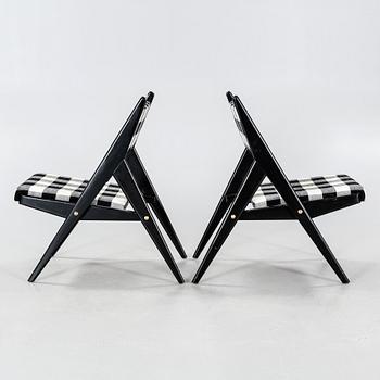 A pair of mid 20th century chairs.