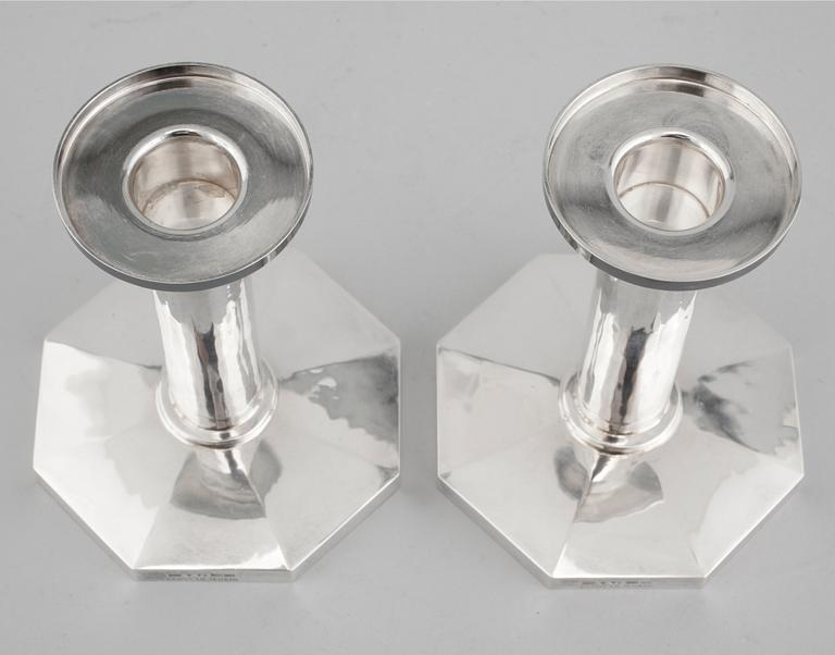 A pair of silver candelsticks by Bengt Liljedahl, STockholm, 1978.