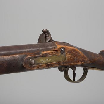 An early 19th century flintlock rifle.