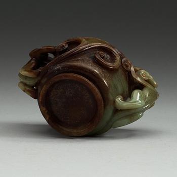 A Chinese nephrite cup with handles.