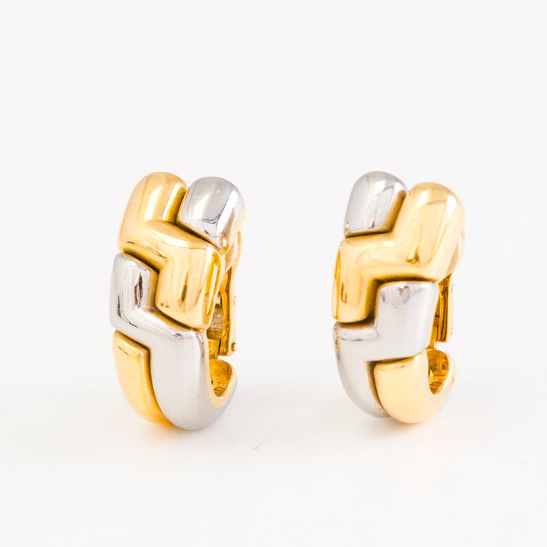 BULGARI, KORVAKORUT, 18K kultaa ja terästä.