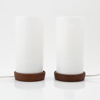 Uno & Östen Kristiansson, a pair of teak and acrylic table lights, Luxus, Vittsjö.