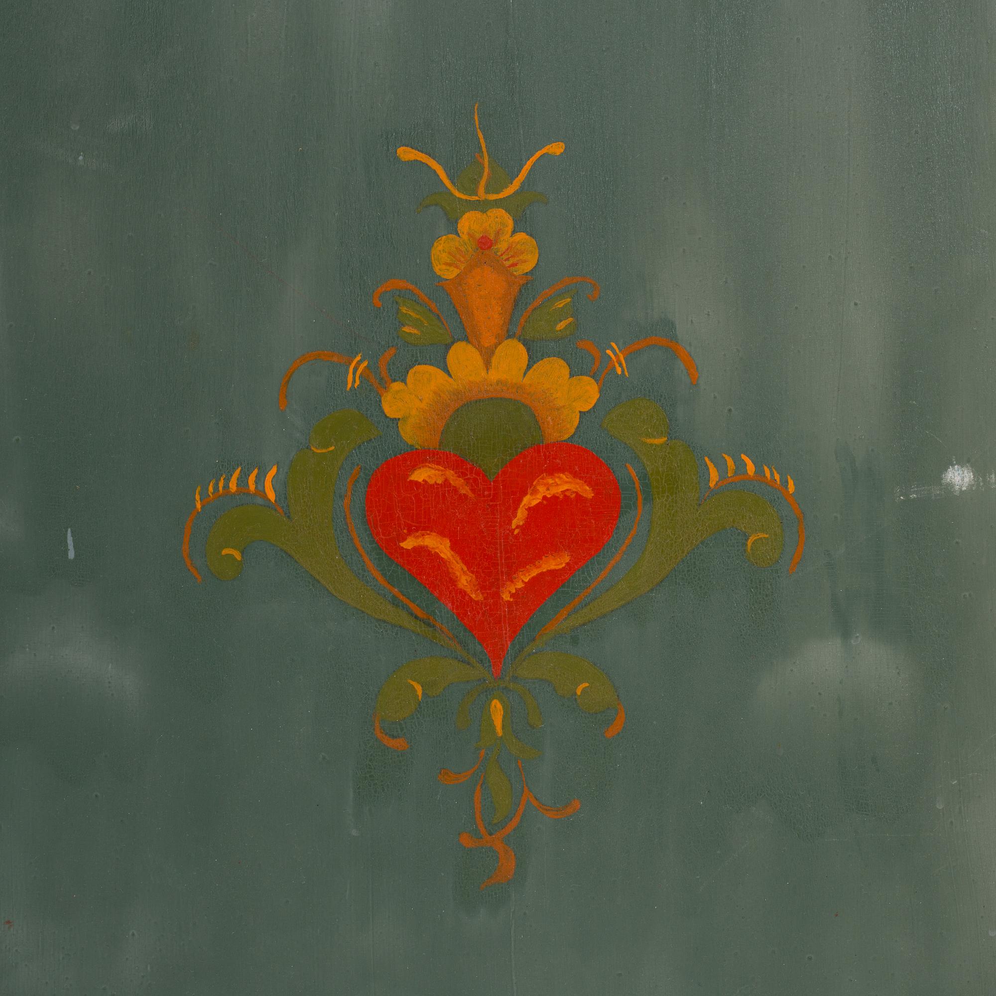 a painted grandfather-clock from the first half of the 19th century.