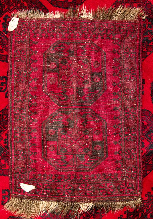 Two Afghan carpets. Ca. 326 x 217 and 88 x 63 cm.
