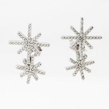 Efva Attling, a pair of "Beam & Stars Two Ear" earrings in rhodium-plated sterling silver with round brilliant-cut diamonds.