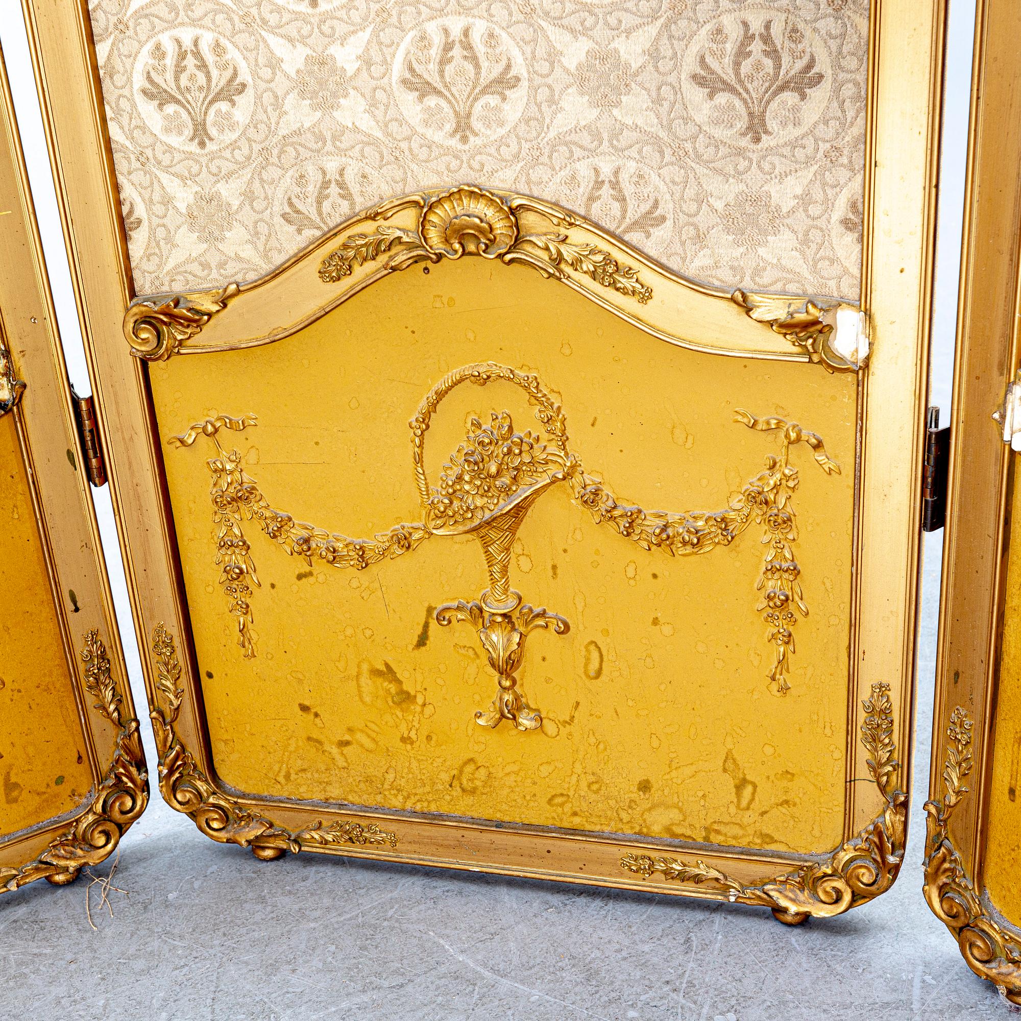 A Louis XV style folding screen around 1900.