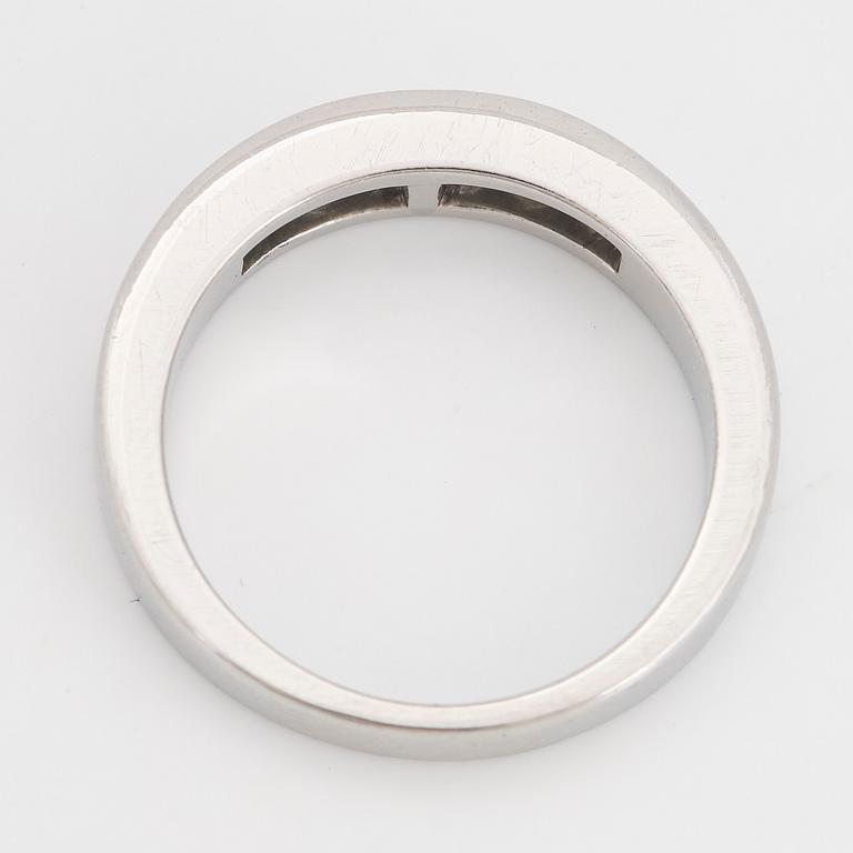 Platinum and six princess-cut diamond ring.