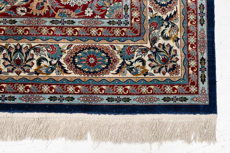 An oriental silk rug. c. 274 x 180 cm .