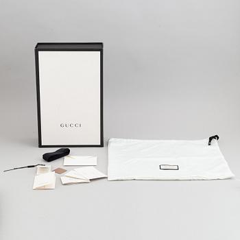 Gucci, a matelassé leather 'Marmont Medium' sholder bag.