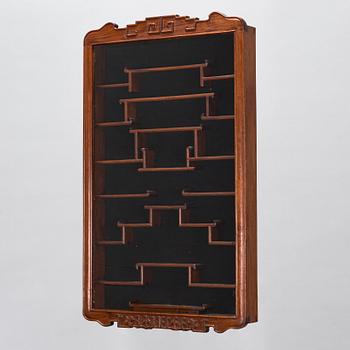 A Chinese 20th century hardwood wall cabinet.