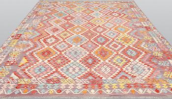 A kilim carpet ca 338 x 256 cm.