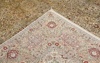 A oriental silk carpet, 350 x 247 cm.