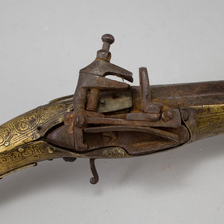 A North African flintlock pistol from the 19th century.