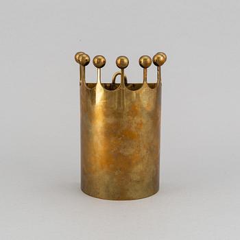 A wall-mounted brass vase by Pierre Forsell from Skultuna.