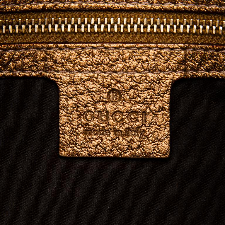 A Gold Leather Hasler Horsebit Hobo Bag.