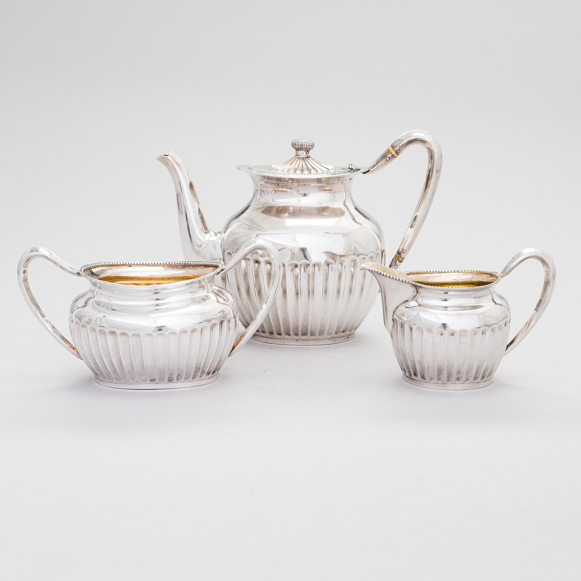 A three-piece gadrooned silver coffee set, Helsinki and Turku 1911 and 1914.