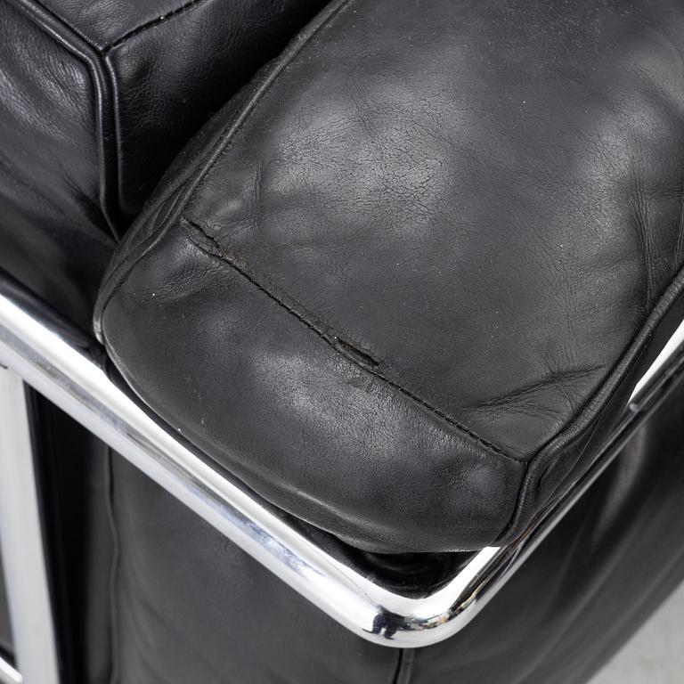 a pair of "LC2" armchairs, Cassina, second half of the 20th century.