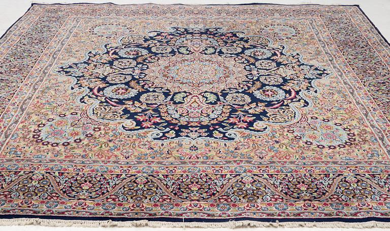 An oriental carpet, c. 385 x 300 cm.