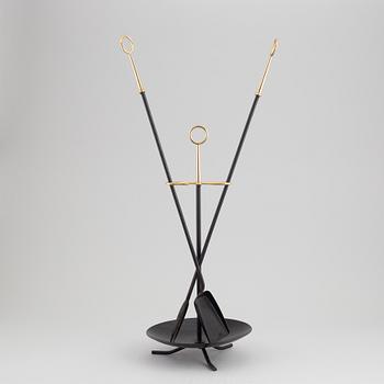 A fireplace stand of three parts by Gunnar Ander for Ystad Metall.