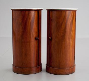 689. A pair of Empire 19th cent mahogany cupboards.
