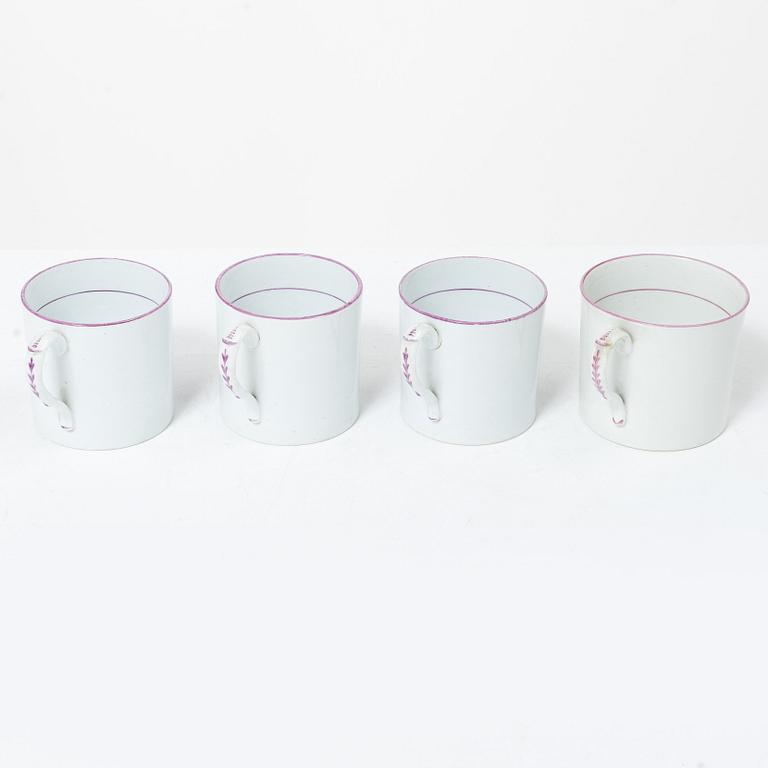 A purple camaieu part coffee service, Early 19th century.