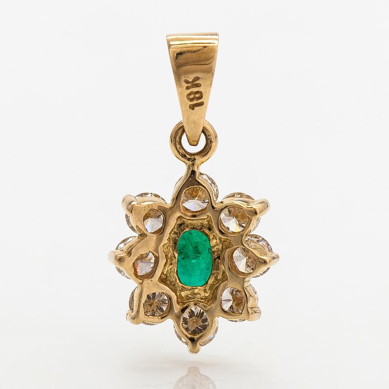 An 18K gold pendant with an emerald and diamonds ca. 0.56 ct in total.