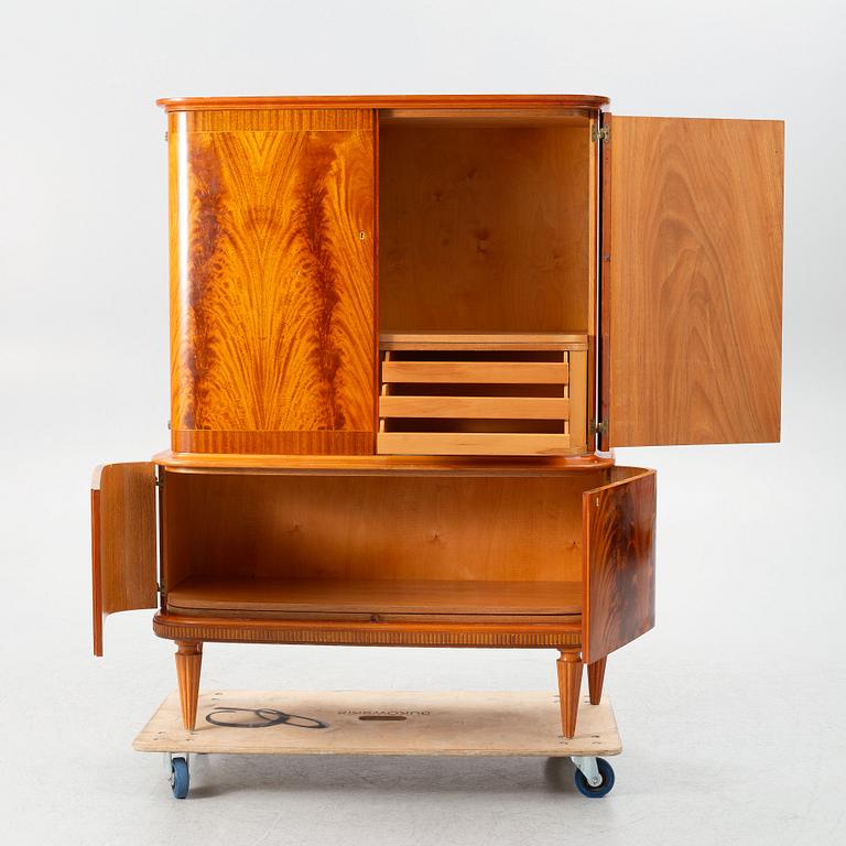 A Swedish Modern cabinet, mid 20th Century.