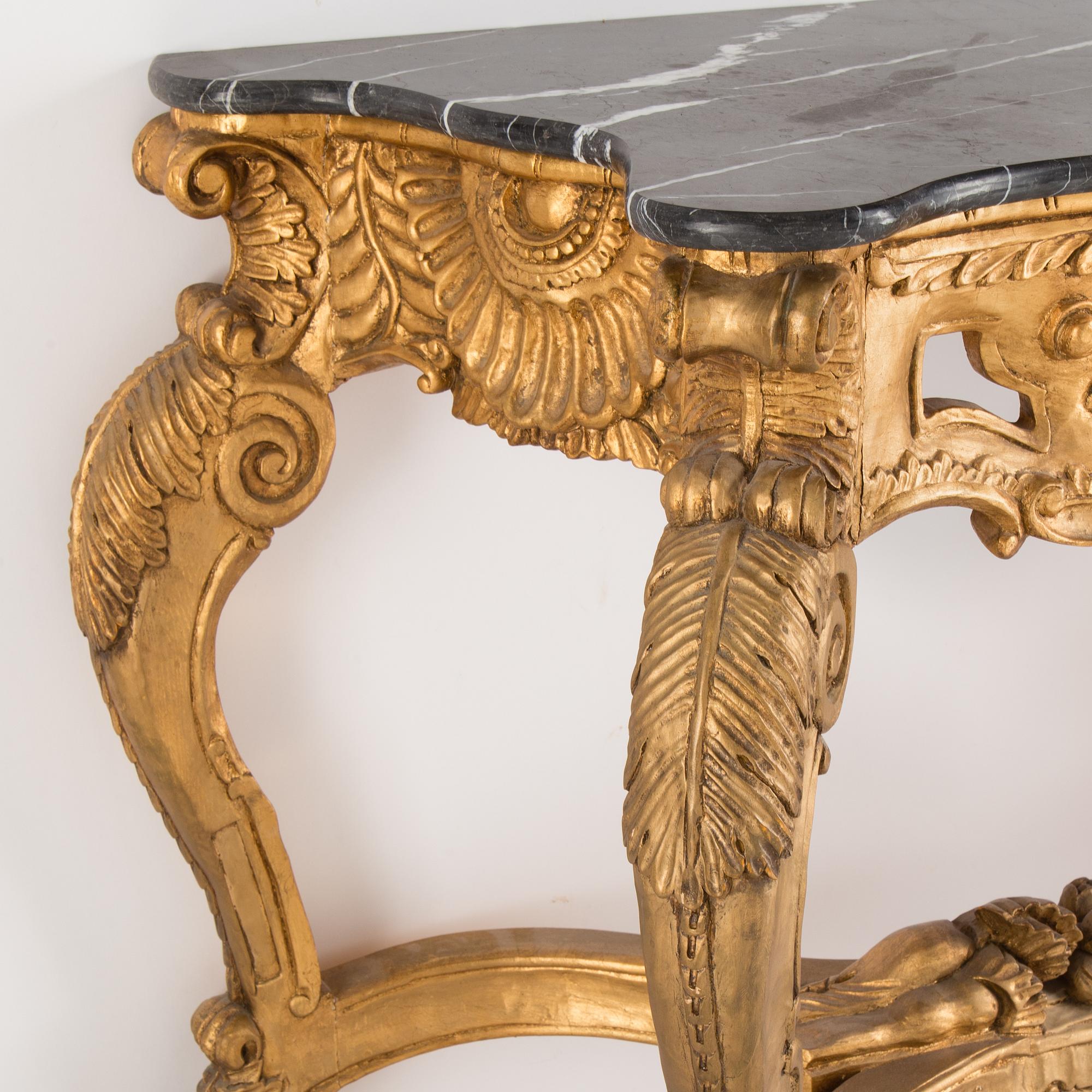 A later part of the 20th century mirror and consol table.