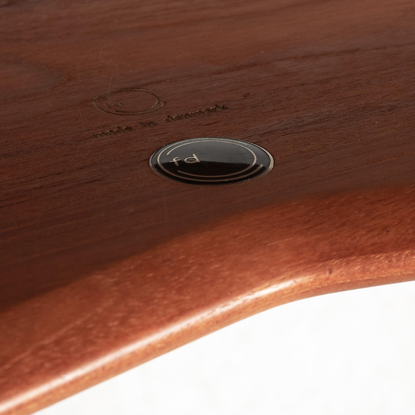 A set of two Danish 'Minerva' sofas with a table for France & Daverkosen.