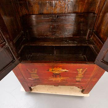 A 20th century Chinese painted wooden cabinet.